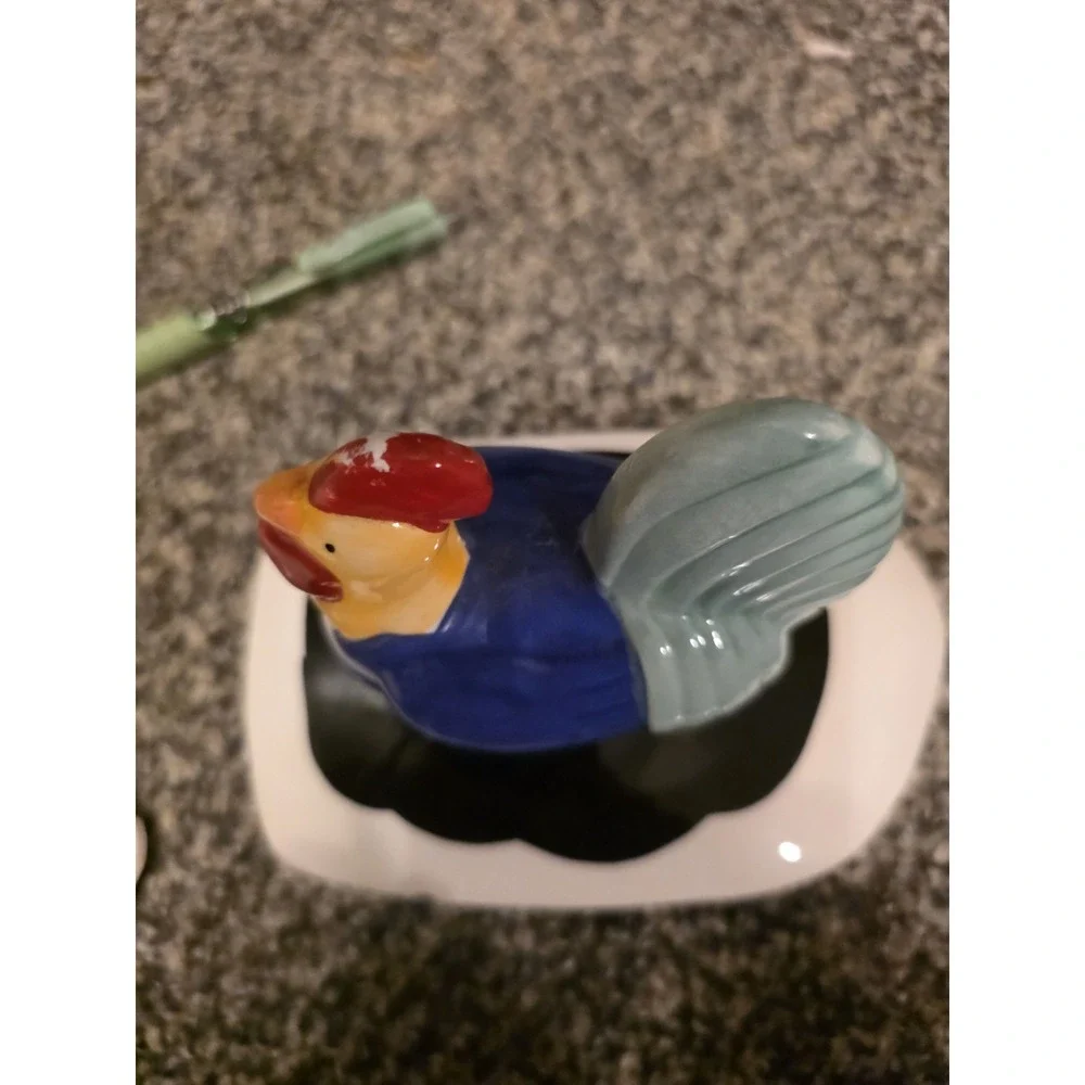 Cow Cookie Jar With Rooster Lid. Small Chip On Lid And Some Red Has Rubbed Off.